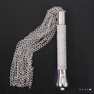 1pc Iron Alloy Whip with Rhinestone studded handle.